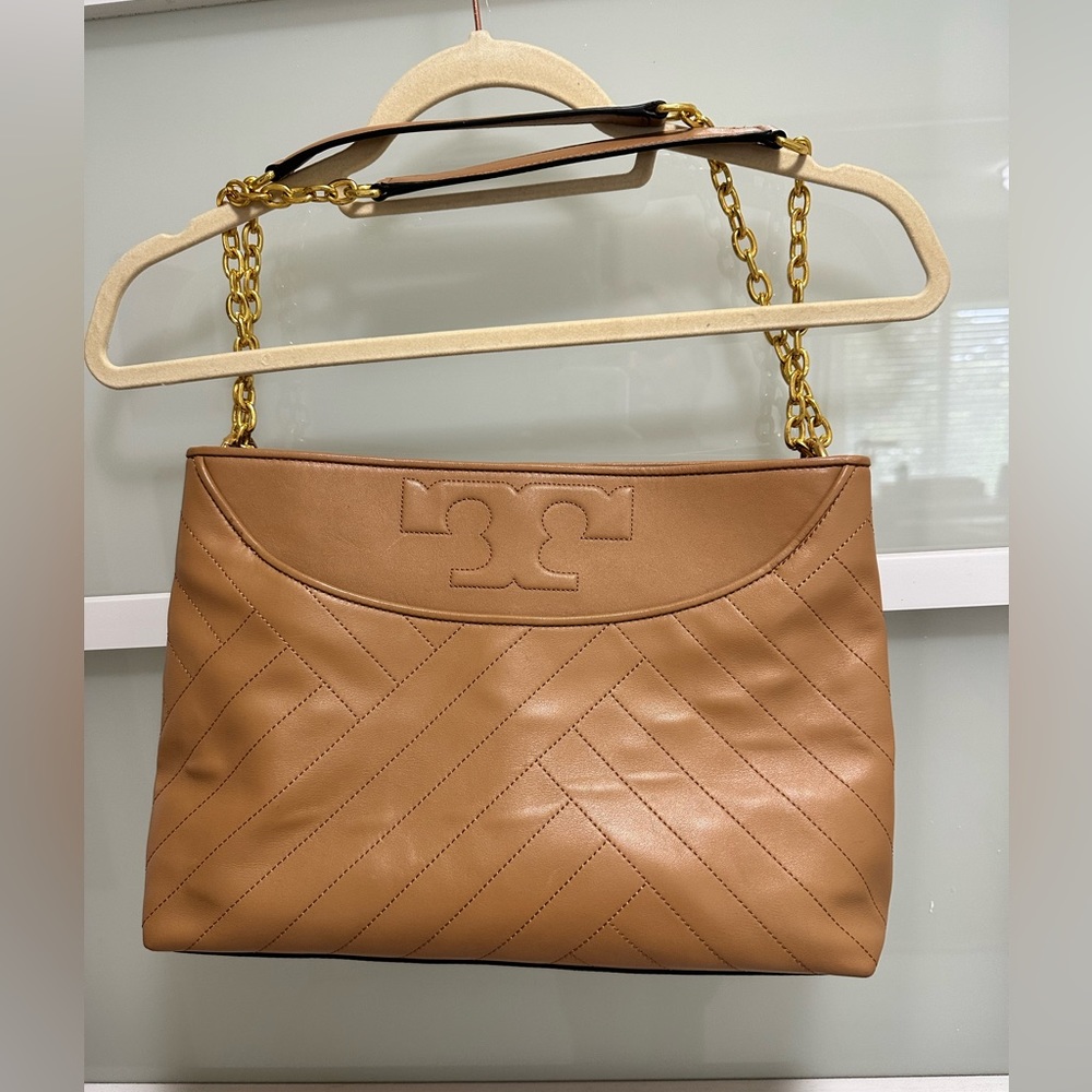 Tory Burch leather shoulder bag. Soft camel color with multiple pockets
